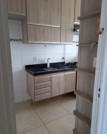 Apartamento com varanda e guarda roupa planejado